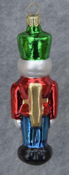 Nußknacker rote Jacke, blaue Hose, grüner Hut